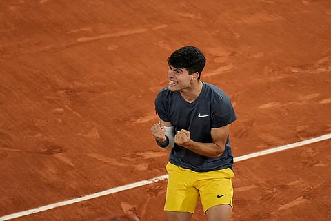 Carlos Alcaraz celebrates as he won the quarterfinal against Tsitsipas